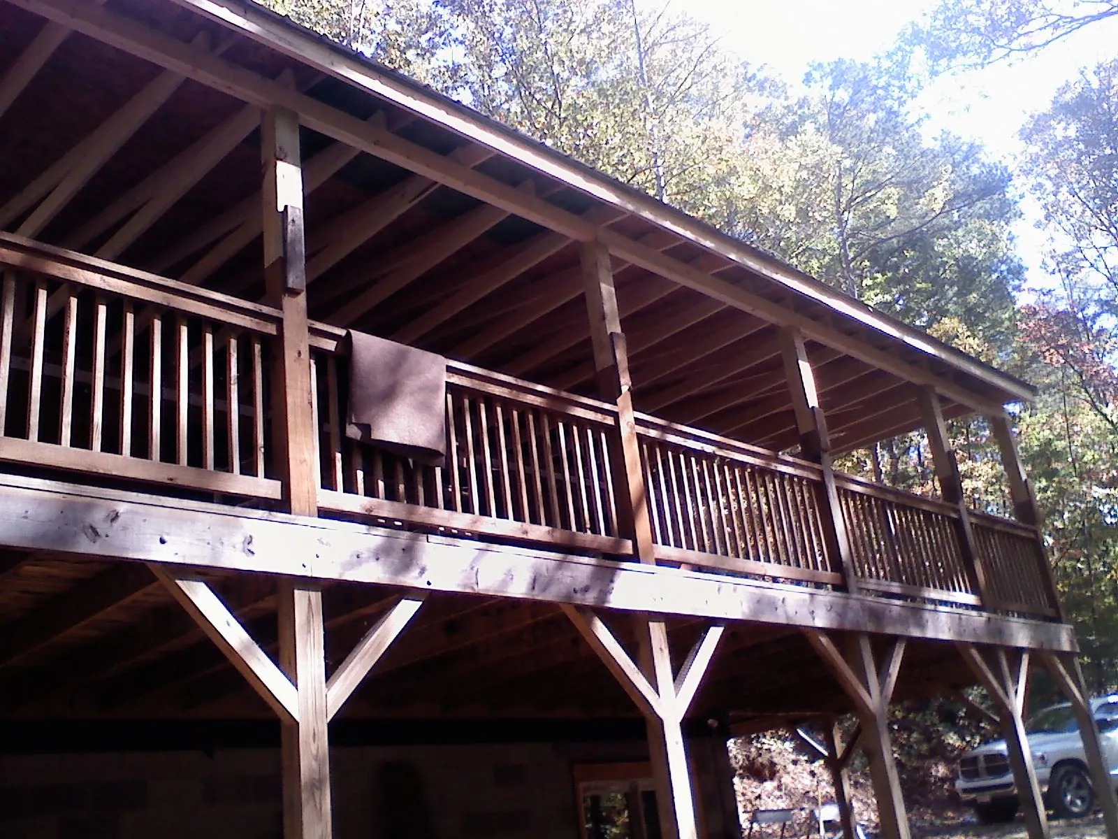 Timber framing under a new elevated porch and deck — Roof Leak Repair in Wolcott by Roofing Brothers